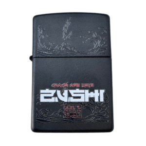 Black Zushi Zippo lighter front with detailed wave engraving and bold ZUSHI logo by THE TENCO