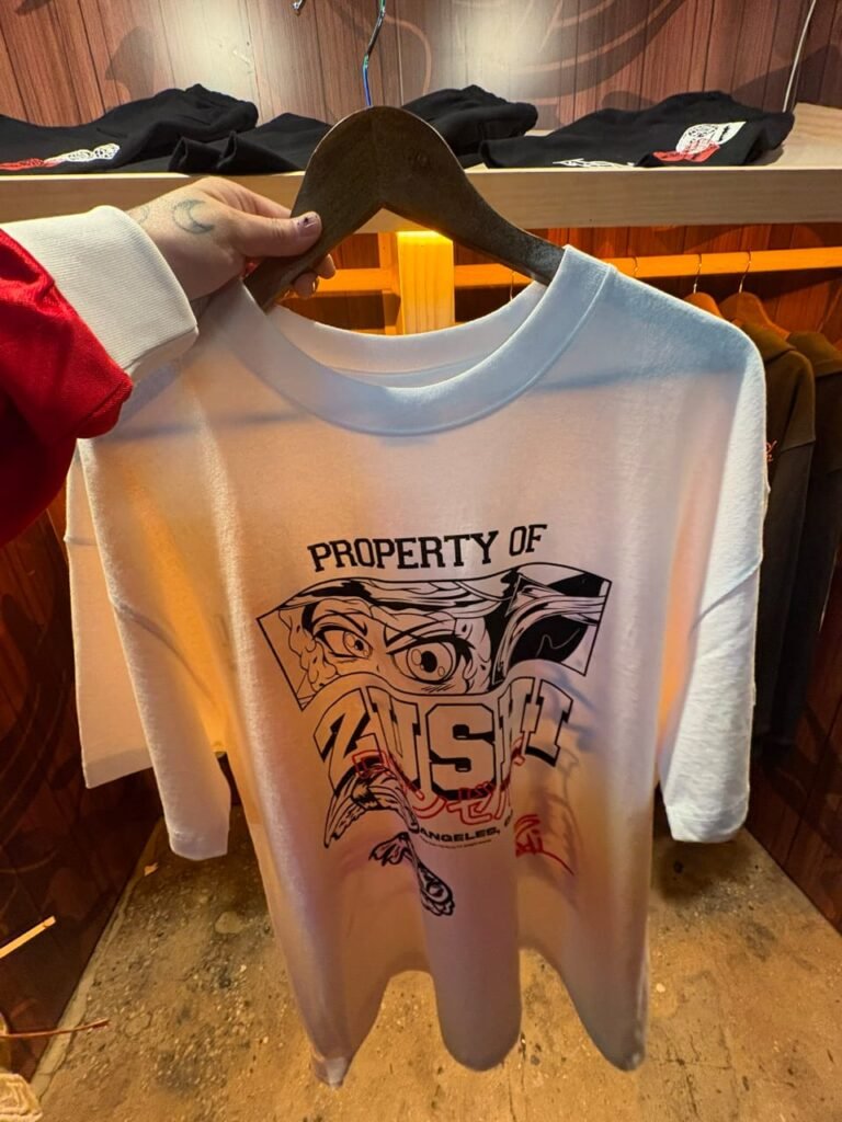 1 example Zushi apparel collection including t-shirts, hoodies, and shorts displayed at Zalympix 2026