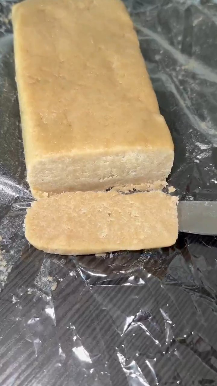 T-BONE HASH By TENCO premium solventless static hash block sliced open showing soft light-tan interior texture