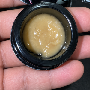 BLUE ZUSHI ROSIN By THE TENCO open jar showing glossy beige cold-cure solventless live rosin concentrate