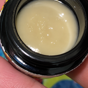 ESCARGOT ROSIN By THE TENCO open jar showing beige cold cure live rosin concentrate