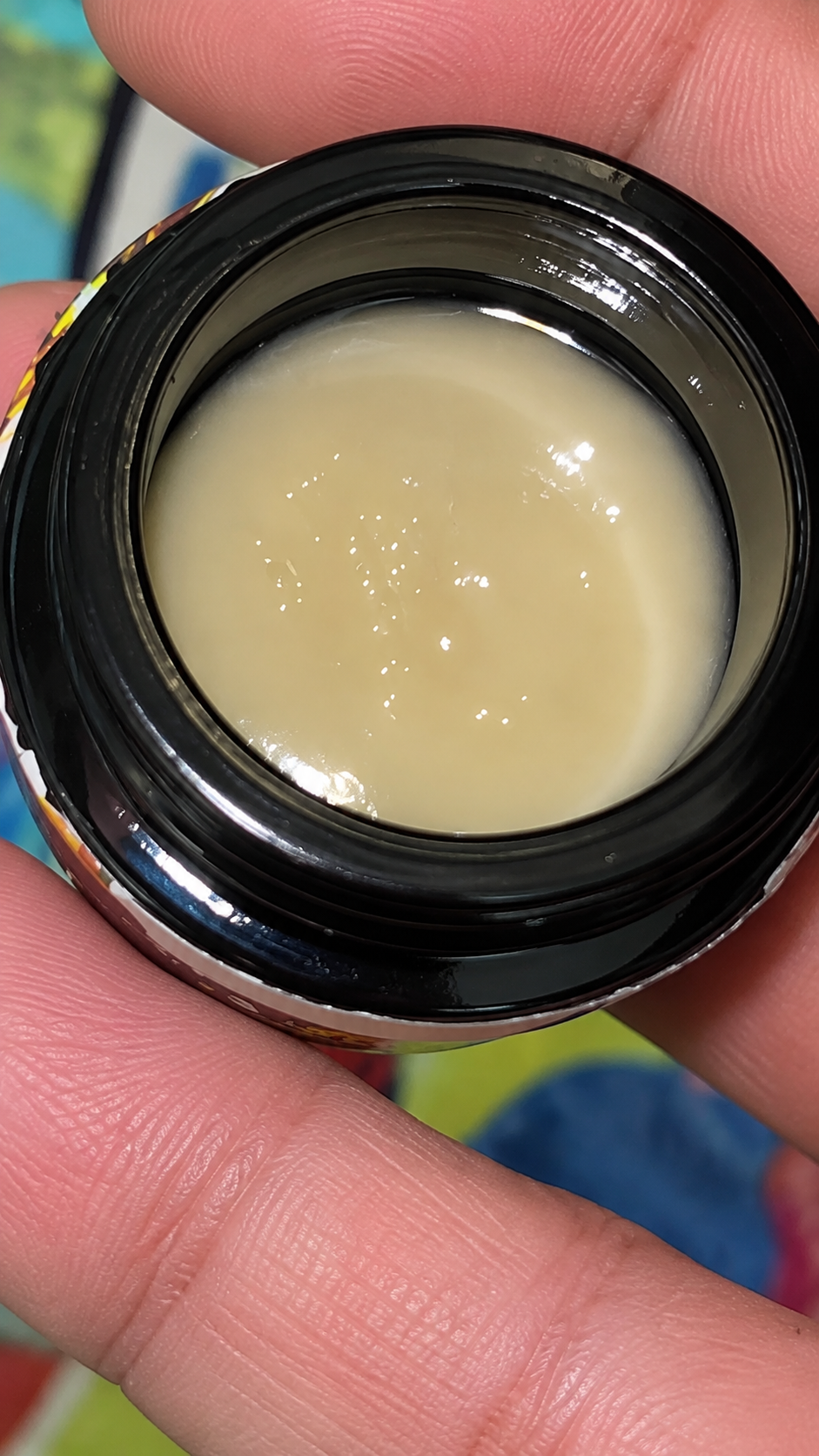 ESCARGOT ROSIN By THE TENCO open jar showing beige cold cure live rosin concentrate