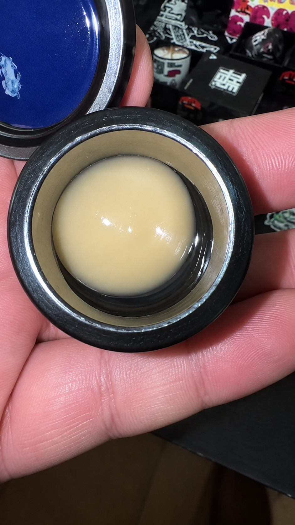 YELLO ZUSHI ROSIN By THE TENCO open jar showing smooth beige indoor live resin concentrate